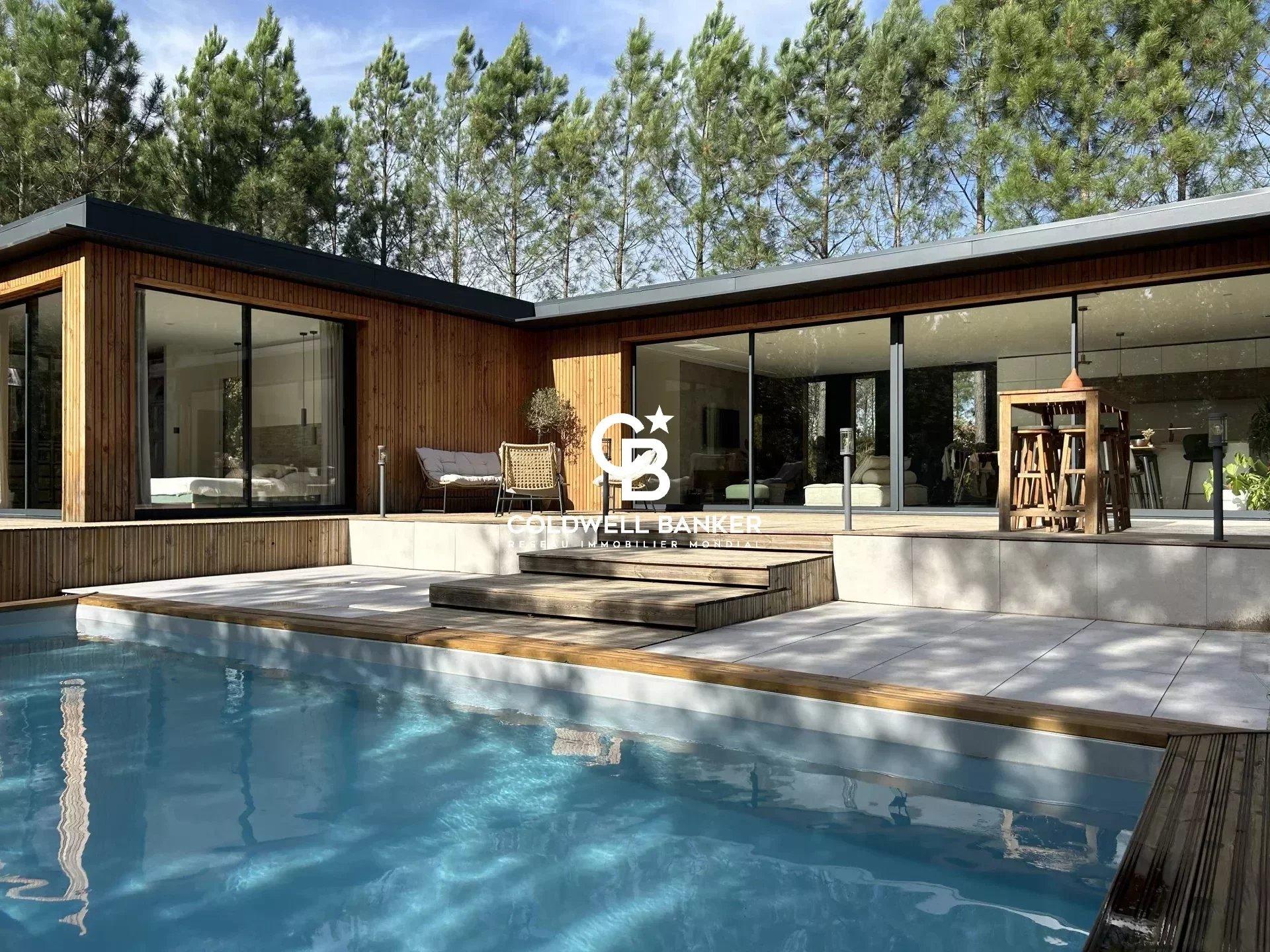Villa contemporaine en bois avec piscine au cœur de la forêt - Mano