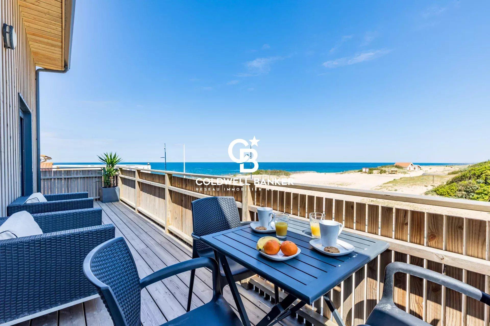 Maison à vendre à Ondres – ensemble immobilier en première ligne, vue océan, maison contemporaine 6 chambres, piscine, garage et murs commerciaux