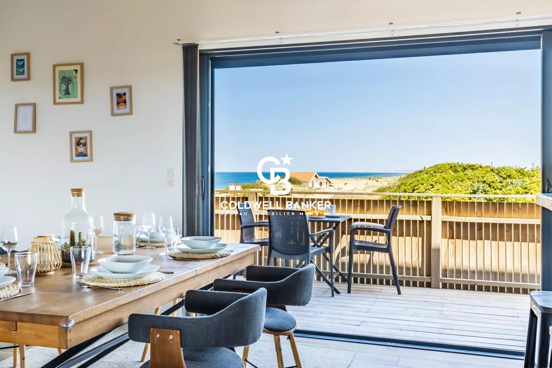 Maison à vendre à Ondres – ensemble immobilier en première ligne, vue océan, maison contemporaine 6 chambres, piscine, garage et murs commerciaux