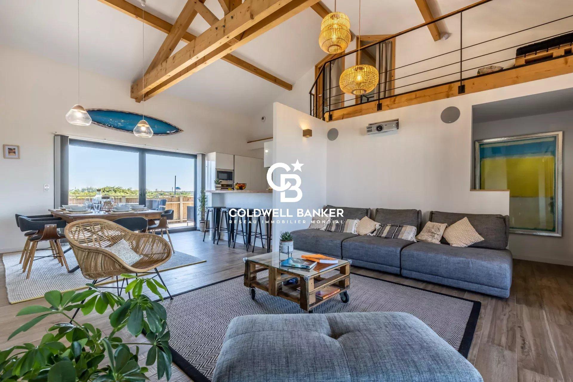 Maison à vendre à Ondres – ensemble immobilier en première ligne, vue océan, maison contemporaine 6 chambres, piscine, garage et murs commerciaux
